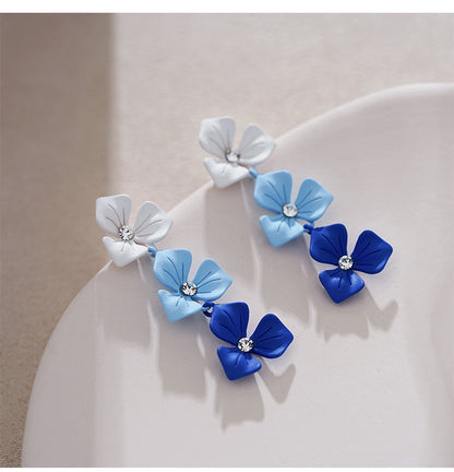 Klein blue stud earrings gradually change flowers