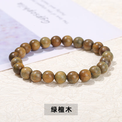 Green sandalwood bead bracelet.