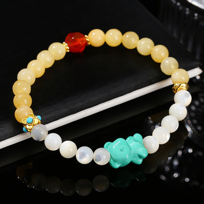 Natural white pearl shell rice topaz mixed bracelet.