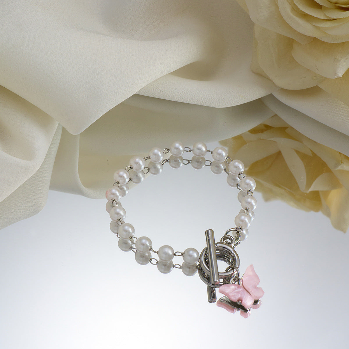 Pink Butterfly Pendant Pearl Bracelet