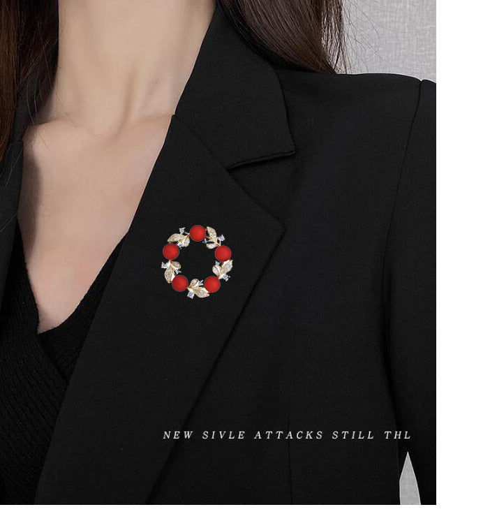 Red brooch