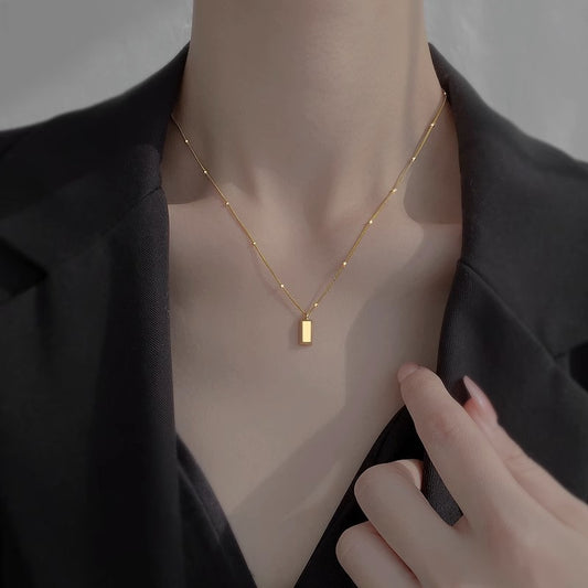 Long square small gold brick necklace