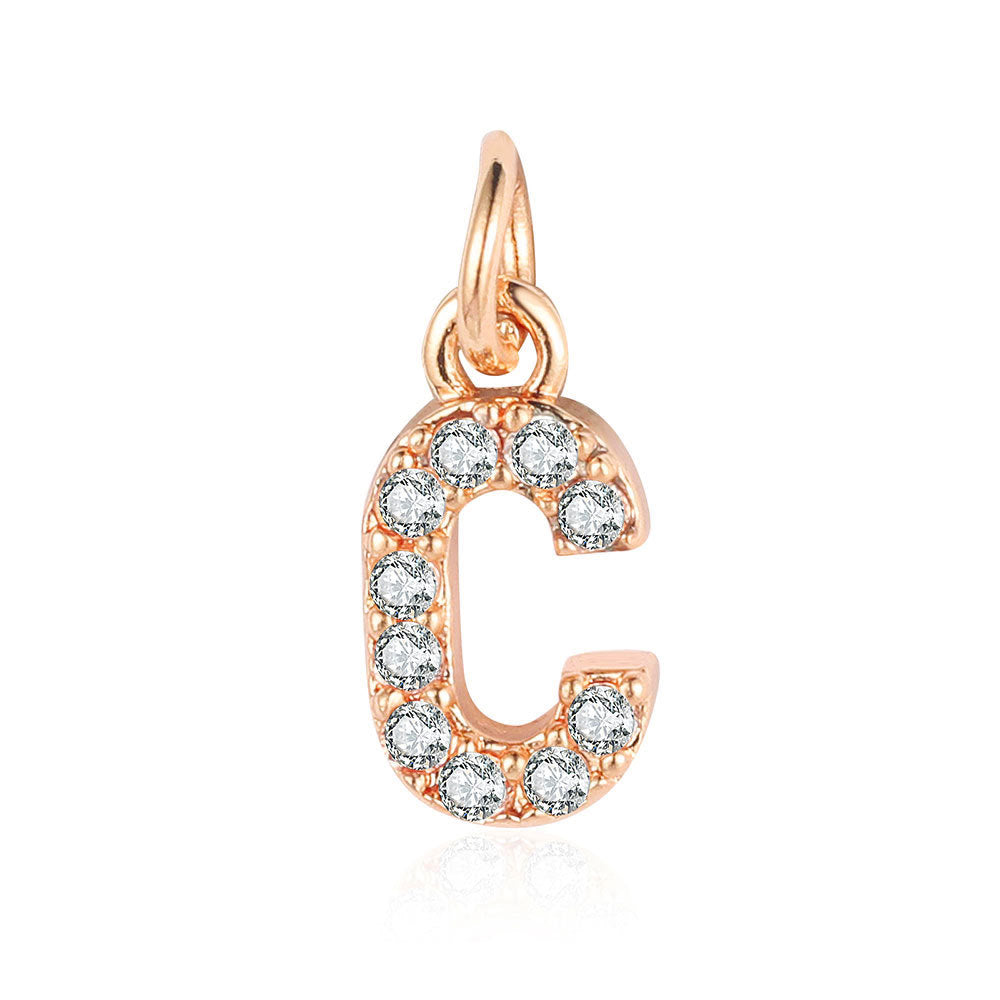 26 rose gold English letter copper zircon pendants.