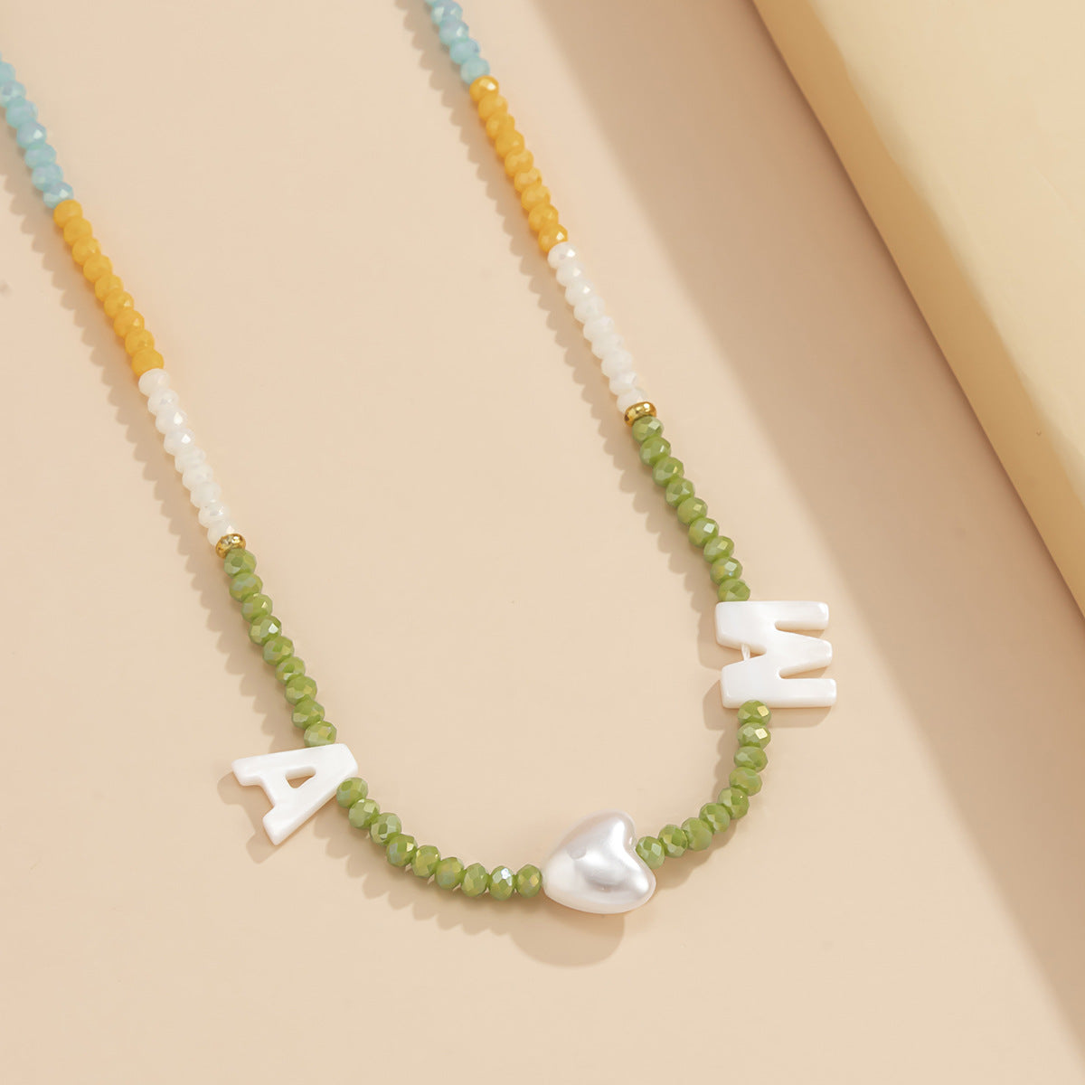 Handmade rice bead letter necklace