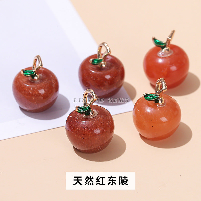 Natural stone crystal apple pendant.