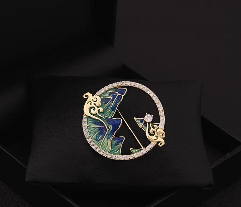 Thousand miles of rivers and mountains brooch