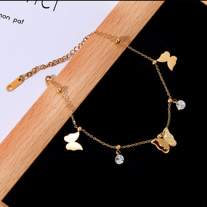 Golden butterfly anklet woman