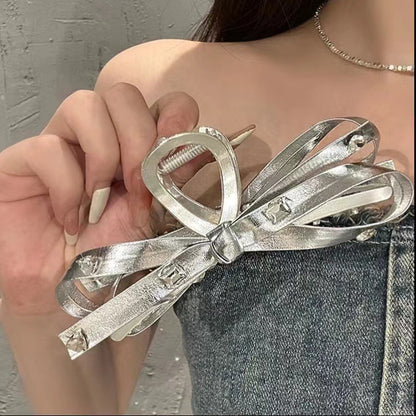 Large silver bow clip