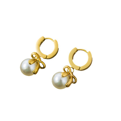 French bow pearl earrings