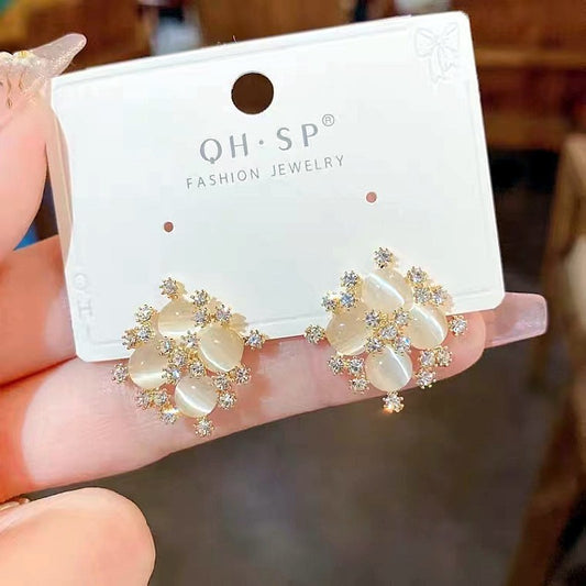 New opal rhinestone snowflake earrings