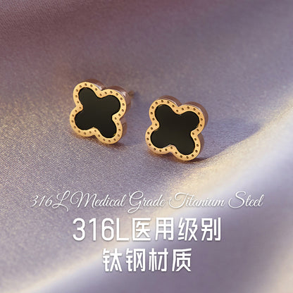 Four-leaf clover titanium steel ear buckle