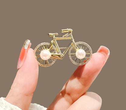 Cartoon bicycle brooch