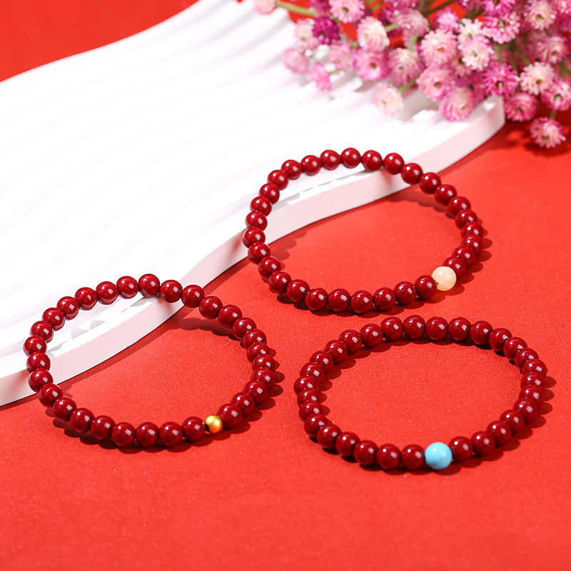 Cinnabar bead bracelet.