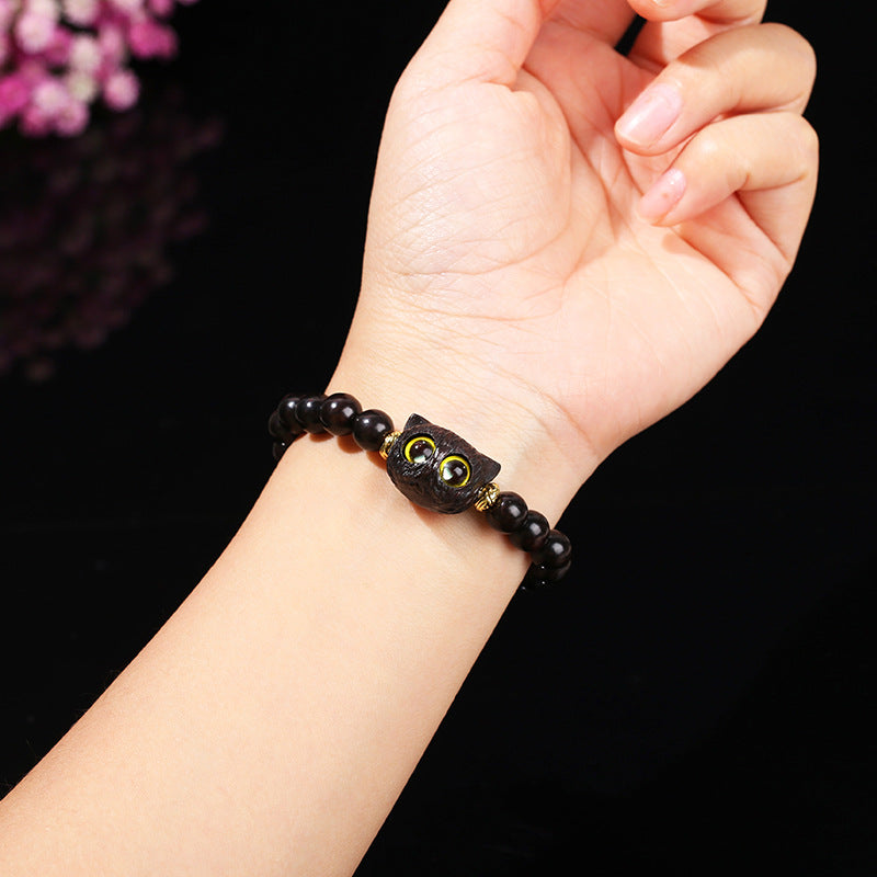 Natural red Dongling spell ebony cat head bracelet.