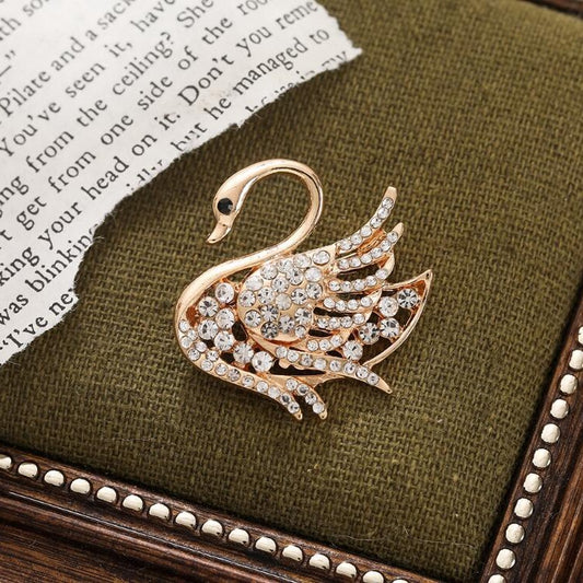 Diamond swan brooch ins