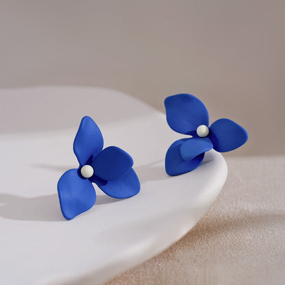 Yellow blue stud earrings niche