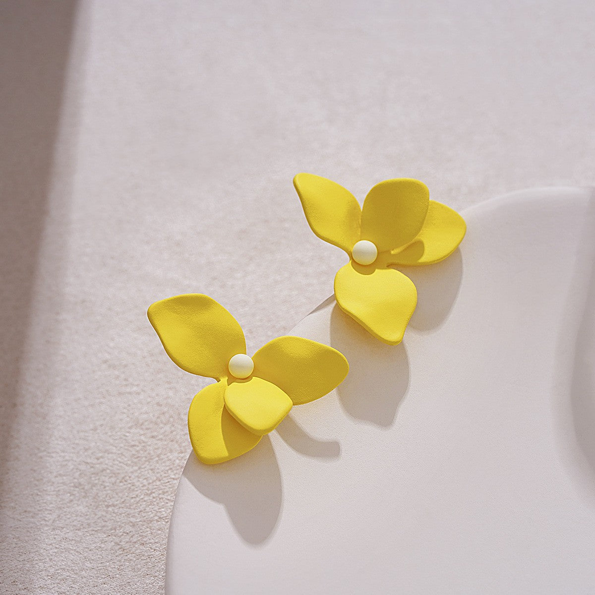 Yellow blue stud earrings niche