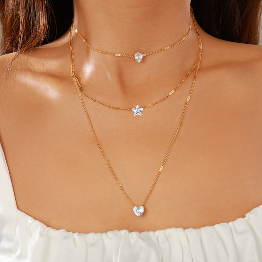 Multi-layered star heart necklace