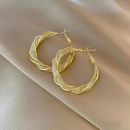 Wrapped metal earrings for women