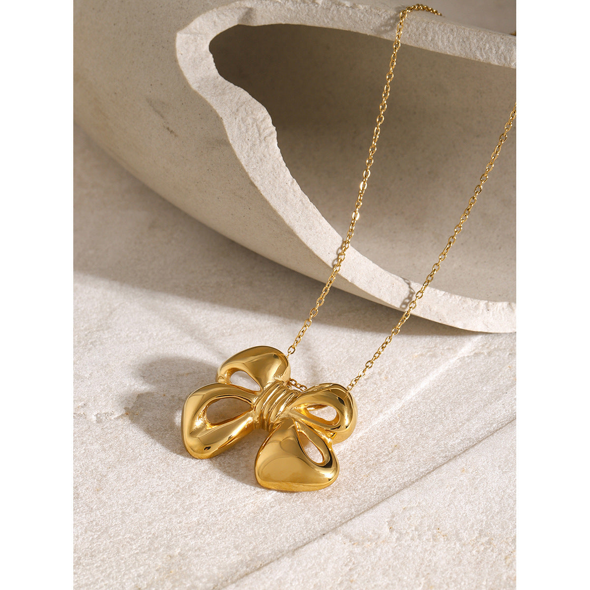 18k gold bow earrings and necklace