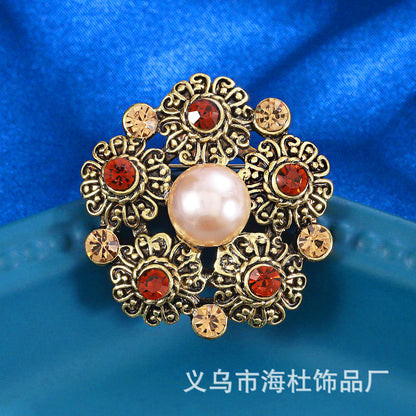 Round hollow pearl gold corsage