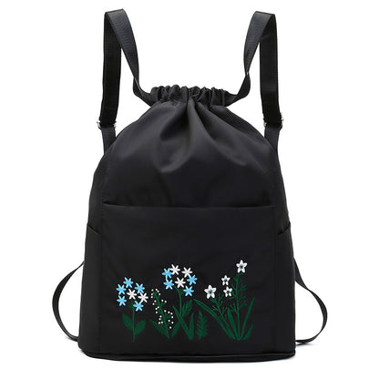 Foldable embroidered travel bag