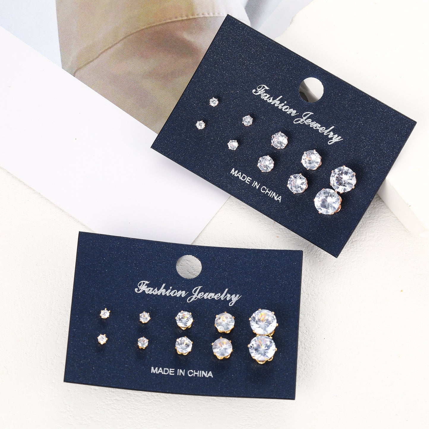 Set of 5 pairs of four-claw rhinestone earrings