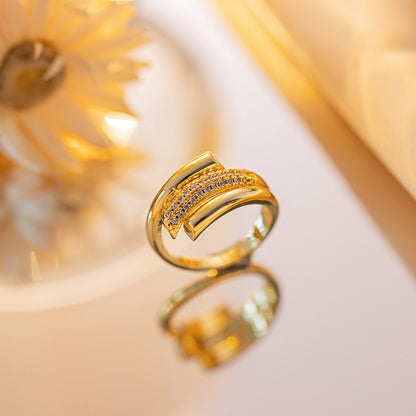 Real gold electroplated zircon ring.