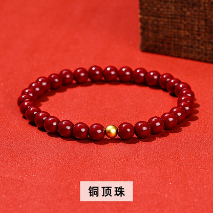 Cinnabar bead bracelet.