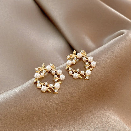 Flower pearl earrings female personality