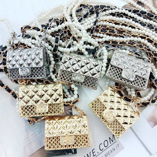 Mini metal hollow rhombus earphone bag