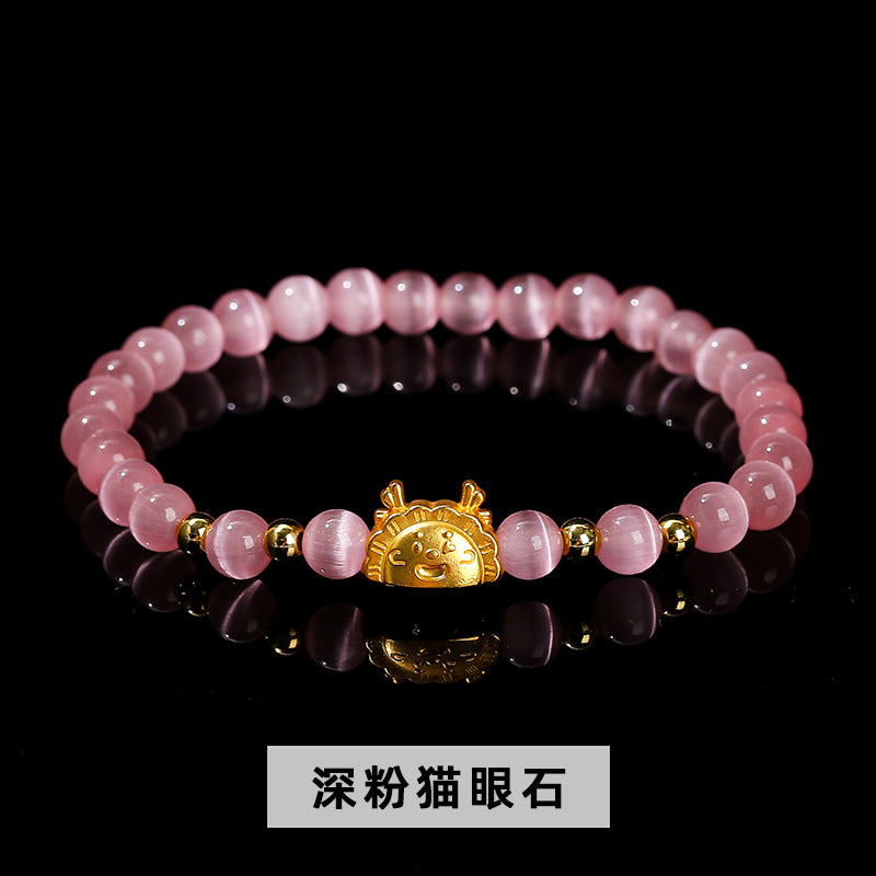 Pink and white cat's eye stone dragon steamed dumpling bracelet.