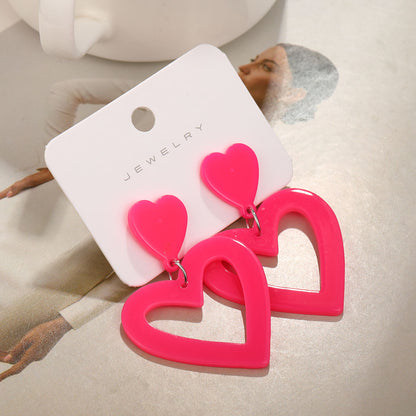 Rose red hollow heart earrings