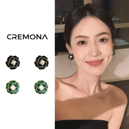 Camellia green oil stud earrings