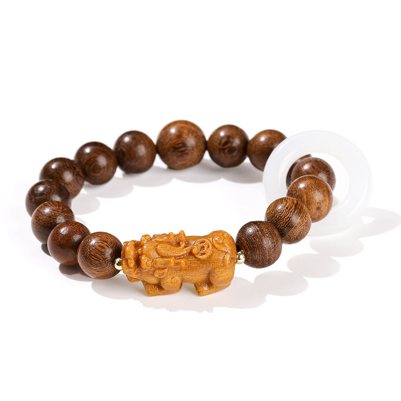 Golden sandalwood imitation white jade running ring bracelet.