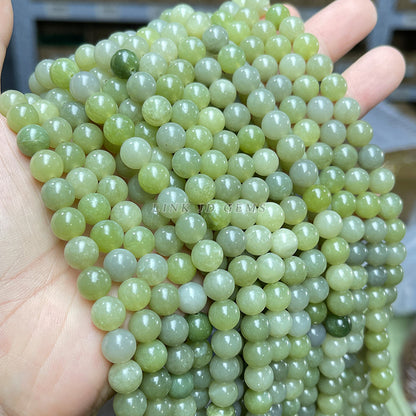 Pulsera de cuentas redondas de jade verde con cuentas sueltas de piedra zafiro en proceso 