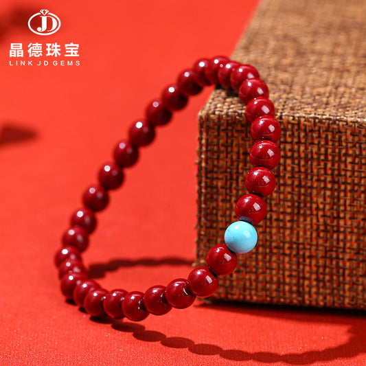 Cinnabar bead bracelet.