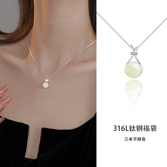 Imitation Hetian jade lucky bag titanium steel necklace