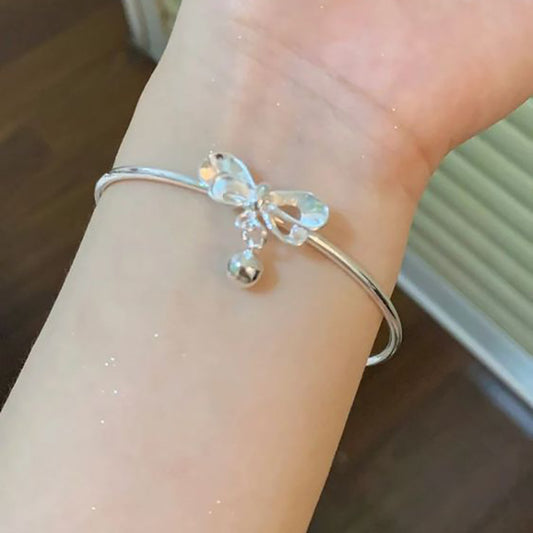 Silver bow bell girlfriends bracelet