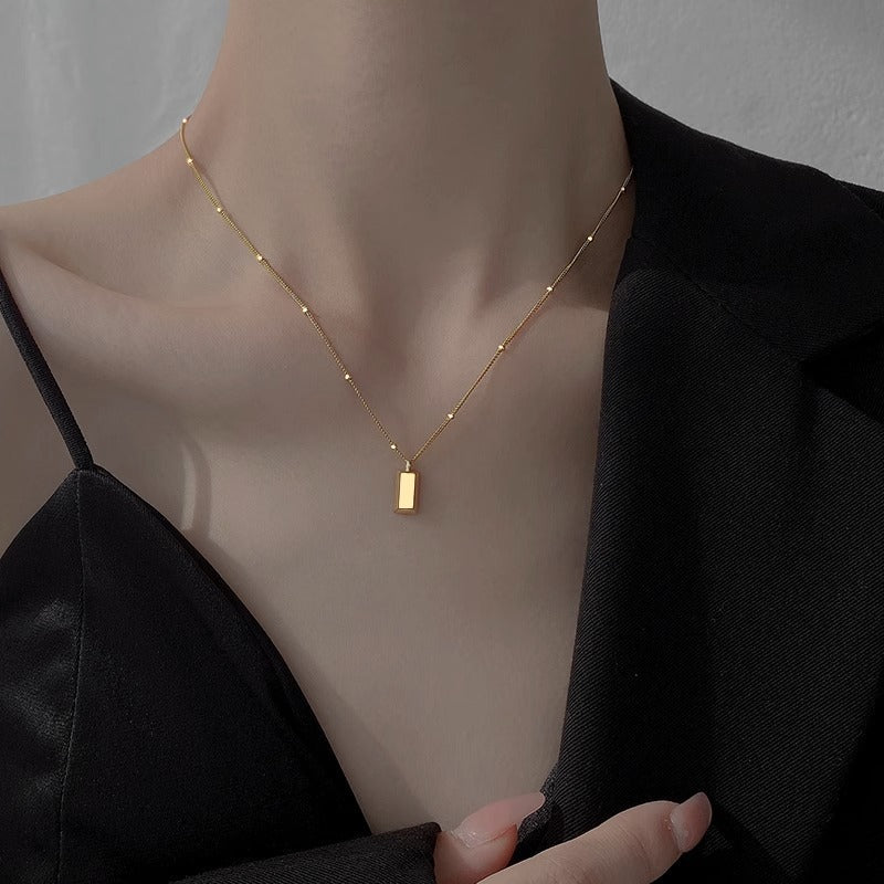 Gold brick silver brick necklace