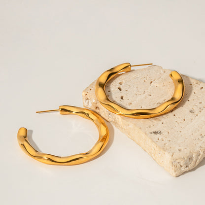 Exaggerated hammered earrings