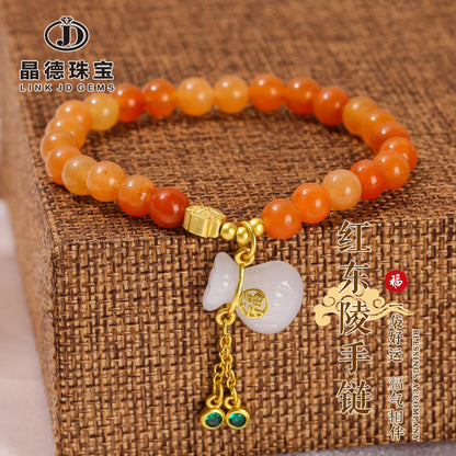 Pulsera de cuentas redondas de jade Dongling rojo natural. 