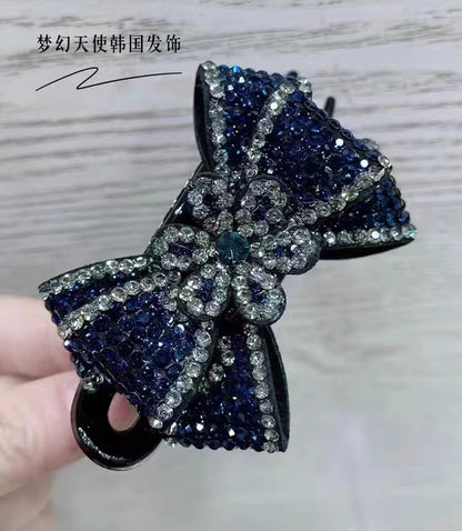 Accesorio para el cabello con pinza de tres dientes y diseño de mariposa con estampado de leopardo 