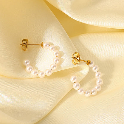 Pearl C-shaped earrings