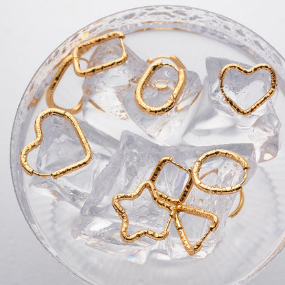 18K gold heart earrings are versatile