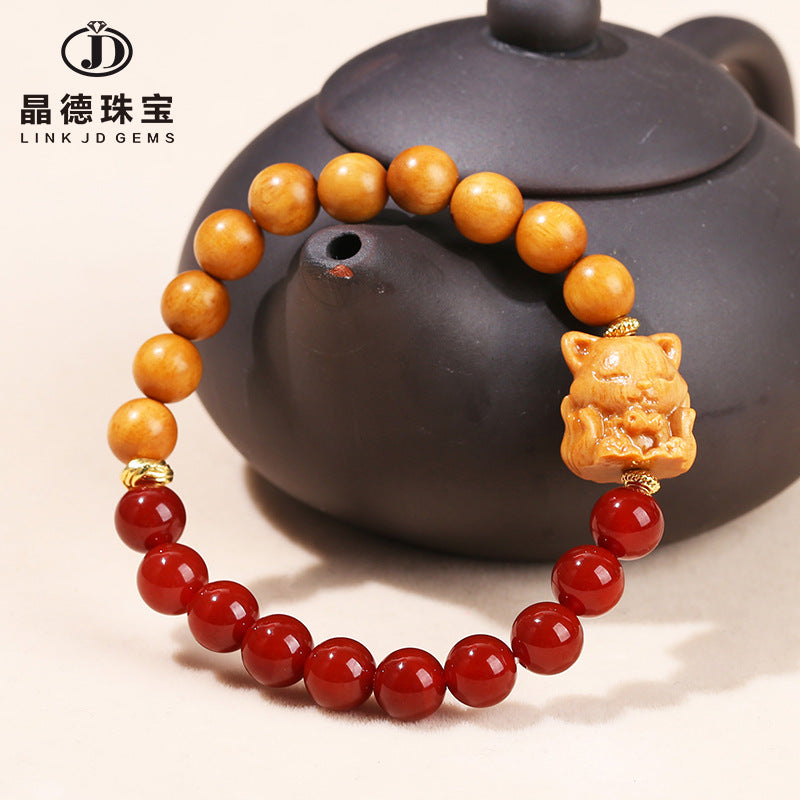 Nanhong agate sandalwood nine-tailed fox bracelet.