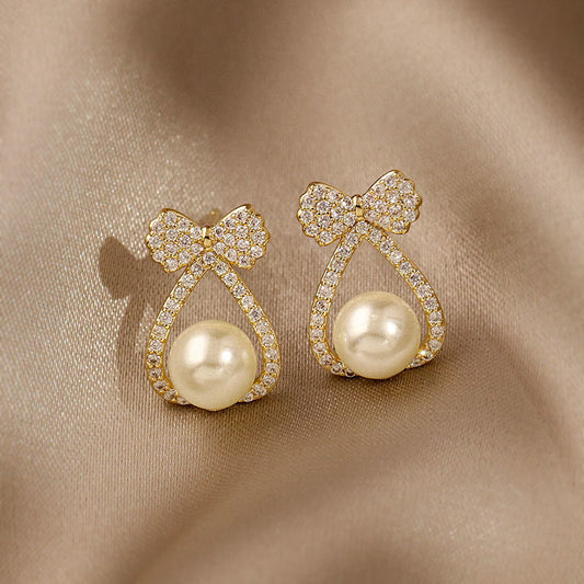 Bow pearl earrings