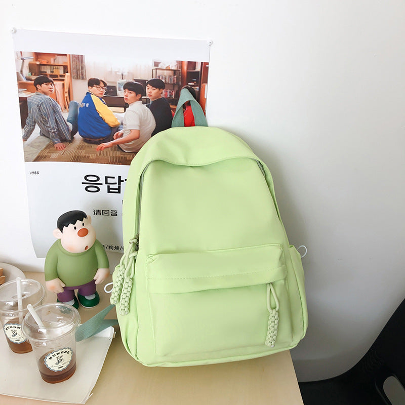 Solid color schoolbag women's simple backpack