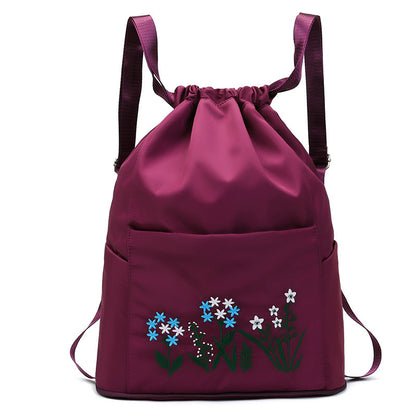 Foldable embroidered travel bag