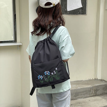 Foldable embroidered travel bag